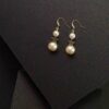 Earrings With Double Pearl and Star