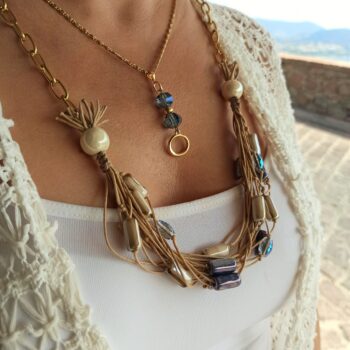 Women's handmade necklace with ceramic plated elements, rhombic blue crystals, acrylic beige cord and gold plated steel chain